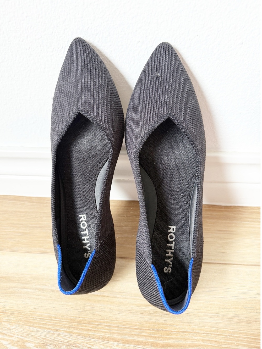 Rothy's Black Pointed Toe Flats with Blue Trim